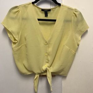 Yellow tied button down shirt